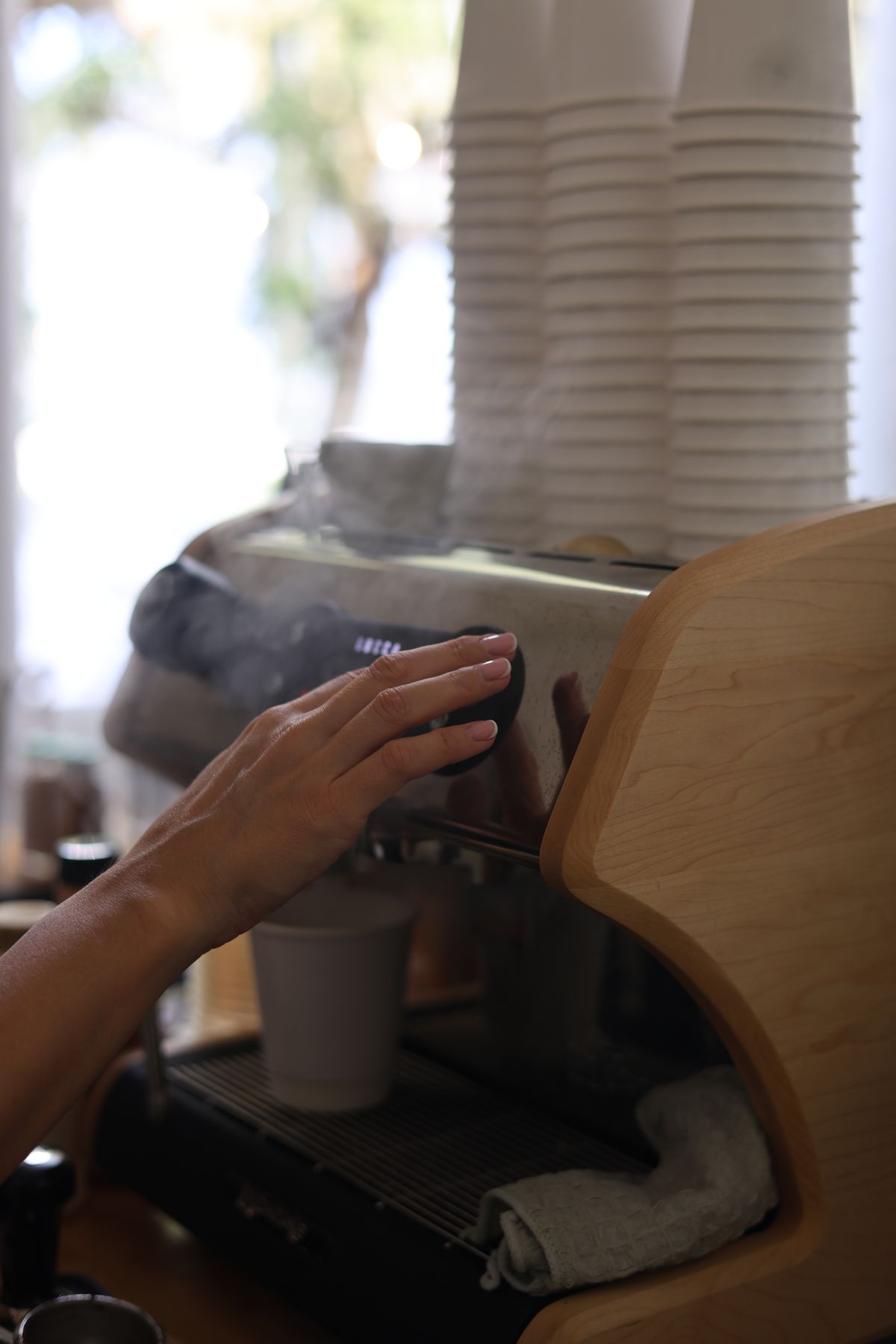 Barista working the espresso machine